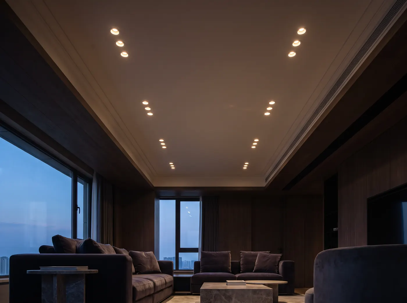 Modern living room ceiling with newly installed recessed lighting